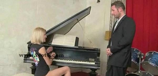  Blonde cutie playing the piano feet sex